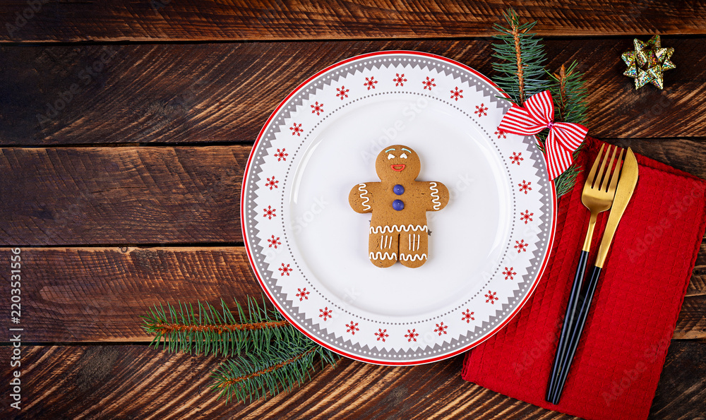 Fototapeta premium Christmas table setting for celebration design. Holiday celebration. Kitchen dining table. Winter holiday season. Food decor. Top view,