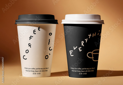Coffee Cup Mockup PSD With Two Branded Takeaway Cups On Warm Studio Background