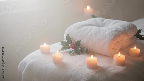 Spa Towels and Candles in Soft Relaxing Light.