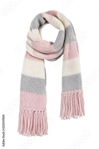 Fotografie Cozy knitted striped scarf in soft pink, gray, and white colors, featuring delic