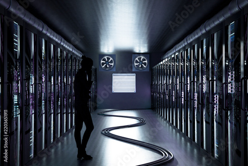 3D illuminated data center corridor with server racks and curved floor cable