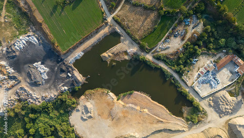 Aerial View of Illegal Dump Site Near Agricultural Fields