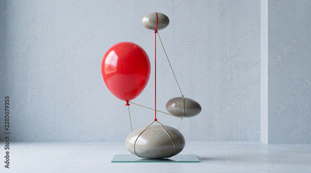 Obraz premium Abstract Conceptual Sculpture Featuring a Vibrant Red Balloon Balanced with Smooth River Stones on a Minimalist Glass Base, Modern Art Representing Equilibrium, Tension, and Gravity in a Studio