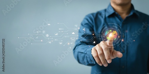 Man in blue shirt touching a glowing digital globe interface with connected network data