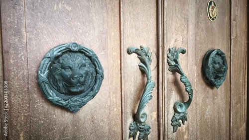 old wooden door with metal handle
