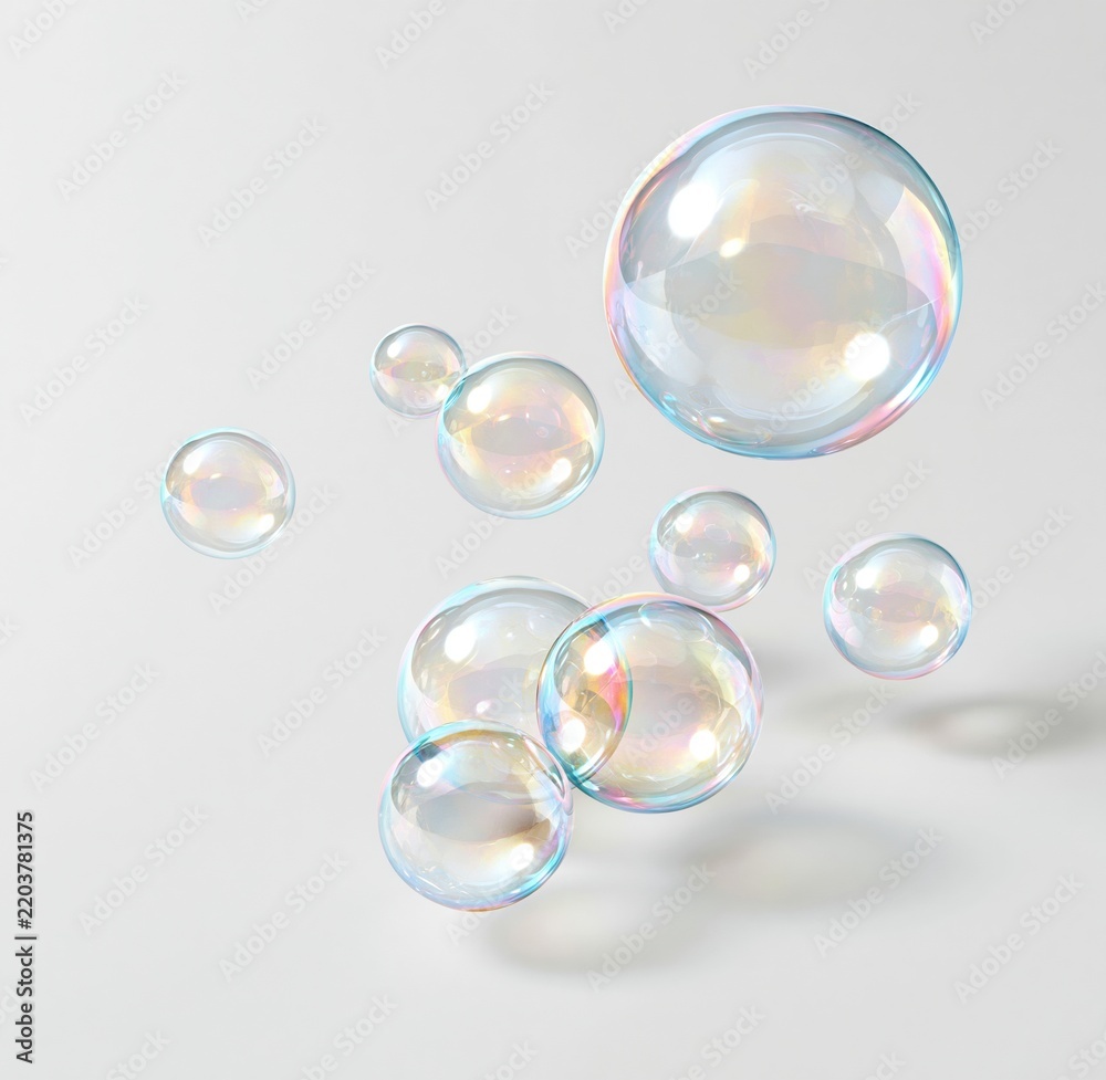 Obraz premium Colorful soap bubbles floating against a white background