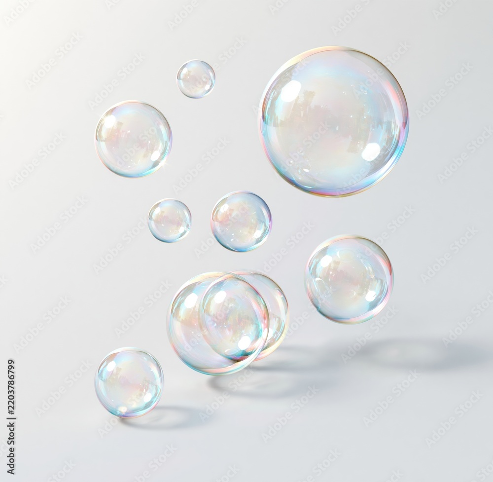 Obraz premium Colorful soap bubbles floating against white background