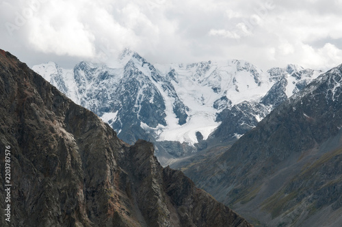 Picturesque snow-covered Altai mountain chains seen from the top of the mount Pyramid, Russian Federation, the Altai Republic