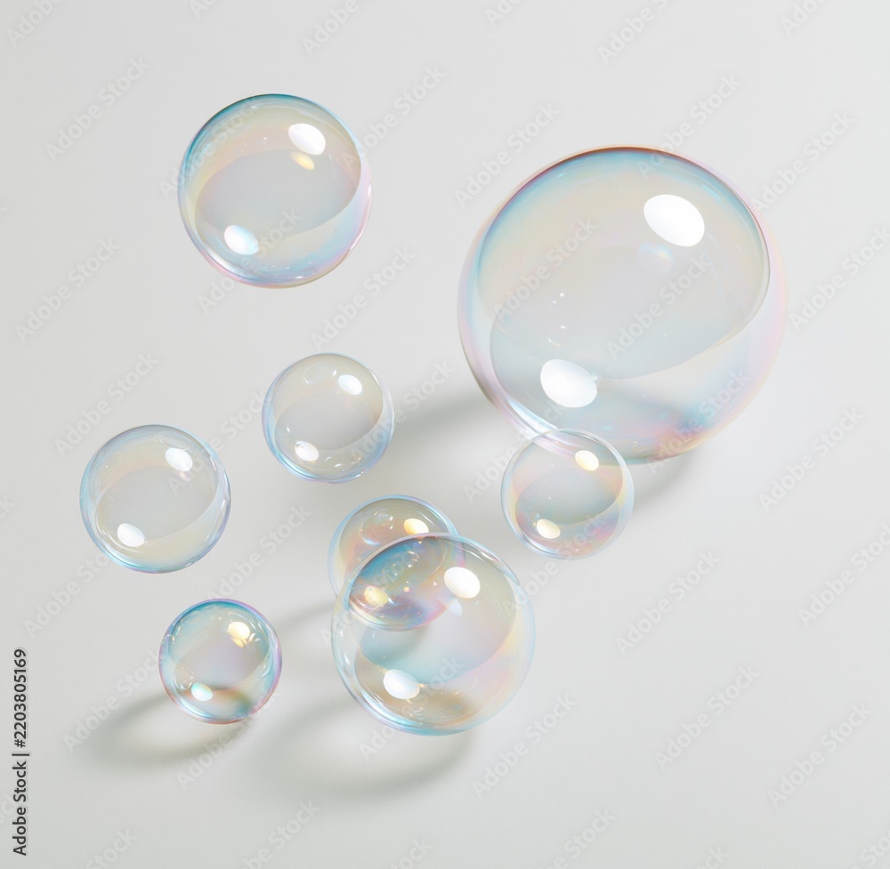 Obraz premium colorful soap bubbles floating on white background