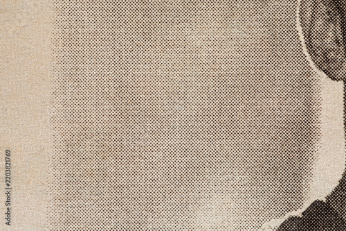 Brown background texture in old vintage paper design with black dotted. Old grunge newspaper texture horizontal background.