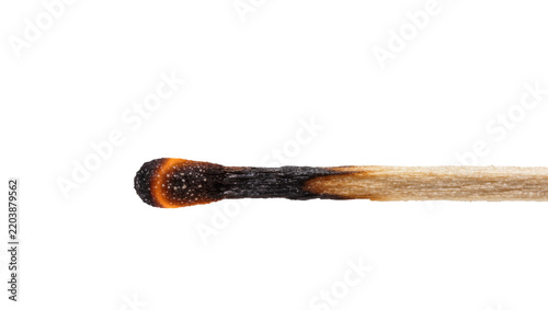 Fotografie Burnt matchstick with glowing orange tip, isolated on transparent background