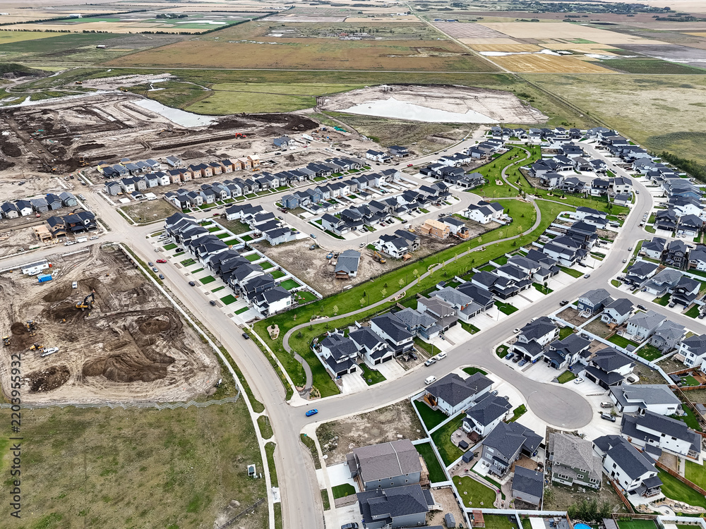 Naklejka premium Drone shot of new suburban homes in Aspen Ridge