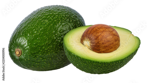 Whole and halved green avocado with large brown seed, isolated on transparent background