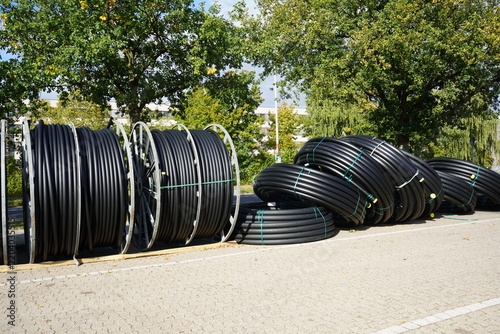 Broadband network deployment in Hannover – Herrenhausen and Stöcken. Fiber-optic cables will subsequently be blown into the protective conduits. Hannover – Stöcken, Germany.