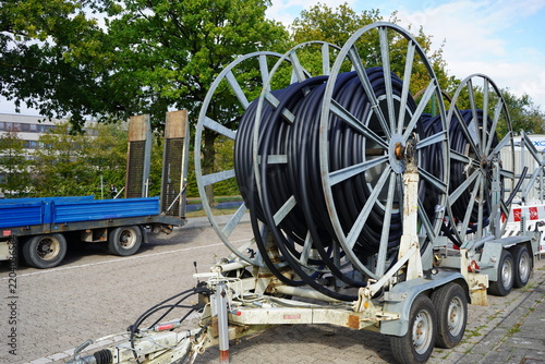 Broadband network deployment in Hannover – Herrenhausen and Stöcken. Fiber-optic cables will subsequently be blown into the protective conduits. Hannover – Stöcken, Germany.