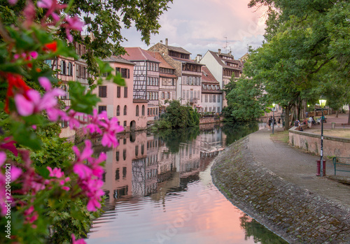 Strasbourg Petite France historic district with half-timbered houses and canal at golden hour, Alsace France
