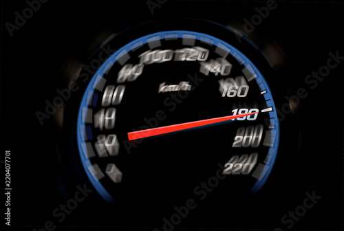 A glowing car speedometer displays a high speed against a dark background.