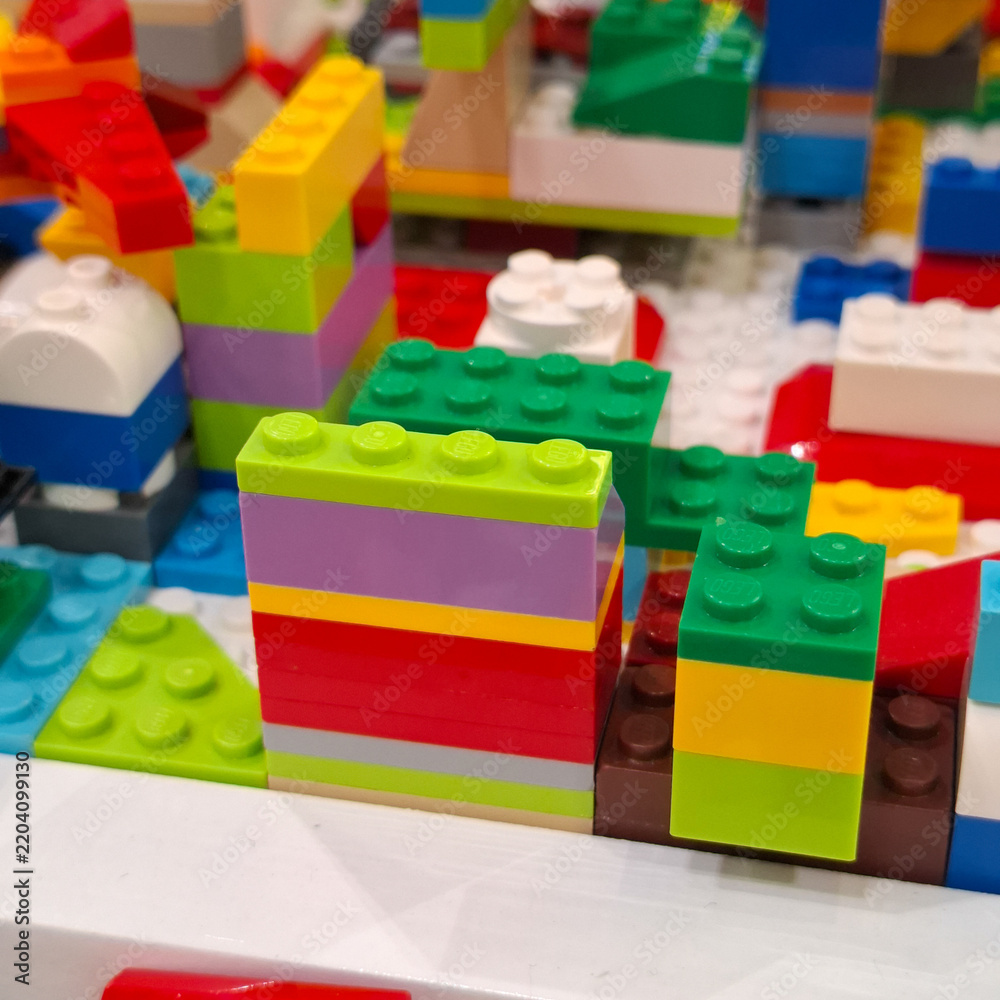 Obraz premium Colorful plastic construction toy Lego bricks stacked together creating creative structures for children education and imaginative play on September 22, 2026 in Bangkok, Thailand 