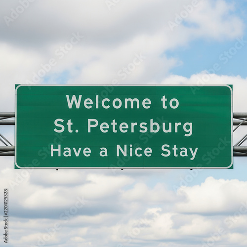 Welcome to St Petersburg highway sign Have a Nice Stay message blue sky with clouds