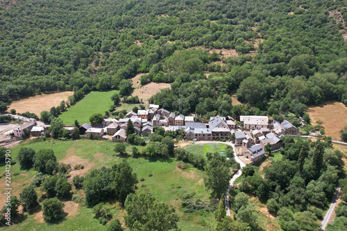 Aerial view of traditional Sorpe village of Catalan Pyrenees  on sunny summer day. Lleida, Spain.