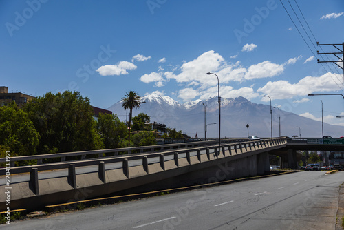 Urban view of Arequipa with snow-capped volcano in the background, Peru