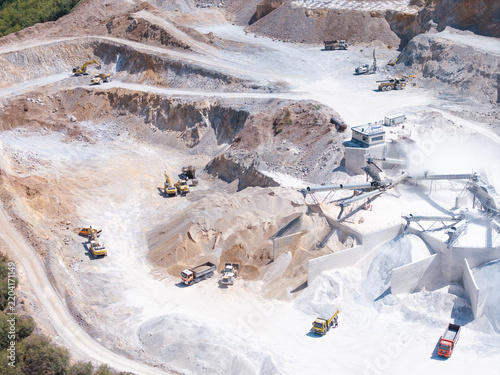 фотографія Aerial view of a stone quarry and processing plant with crushing machinery