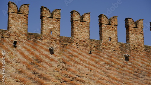 Close up of swallowtail merlons on the walls of Castelvecchio, Verona, Italy