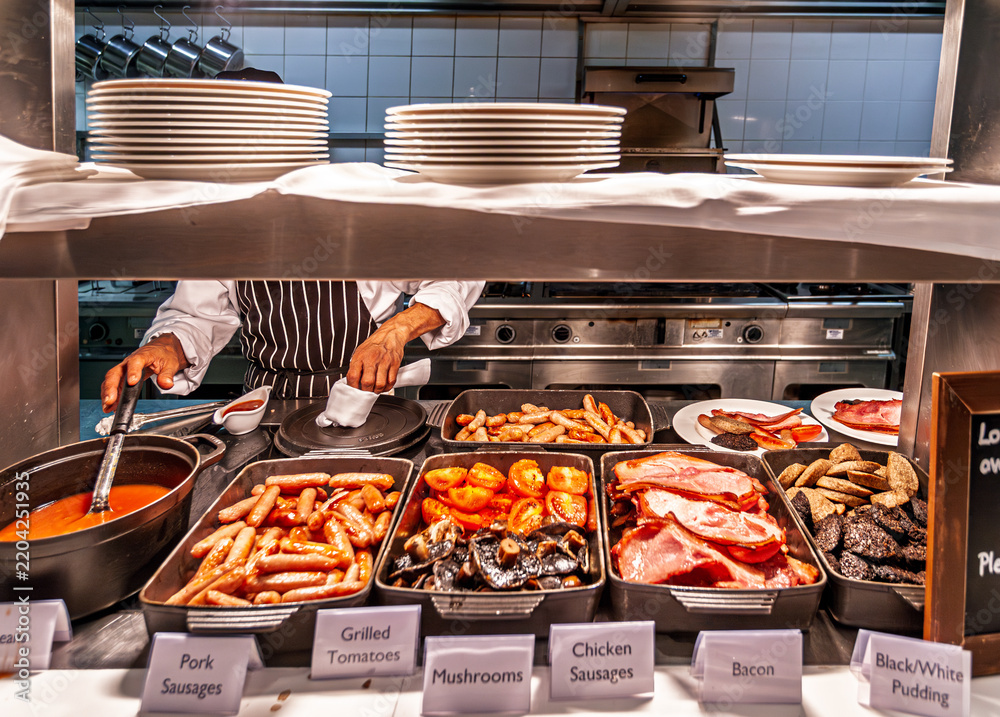 Fototapeta premium Full Irish Breakfast Buffet Selection Served by Chef in Dublin