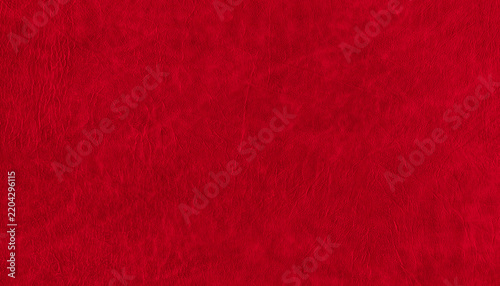 Intense red texture with a fibrous, irregular and subtly wrinkled surface, ideal for abstract backgrounds, graphic designs and decorative compositions.