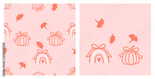 Seamless autumn pumpkin pattern featuring hand drawn orange pumpkins decorated with ribbon bows, rainbow shaped pumpkins with tiny hearts and scattered oak leaves on a soft pastel pink background.