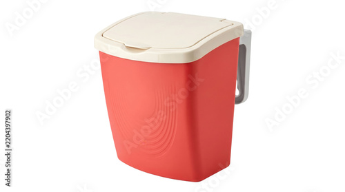 Red plastic hanging trash can with white lid, compact kitchen waste bin for cabinet doors, portable wall-mounted garbage container isolated on white