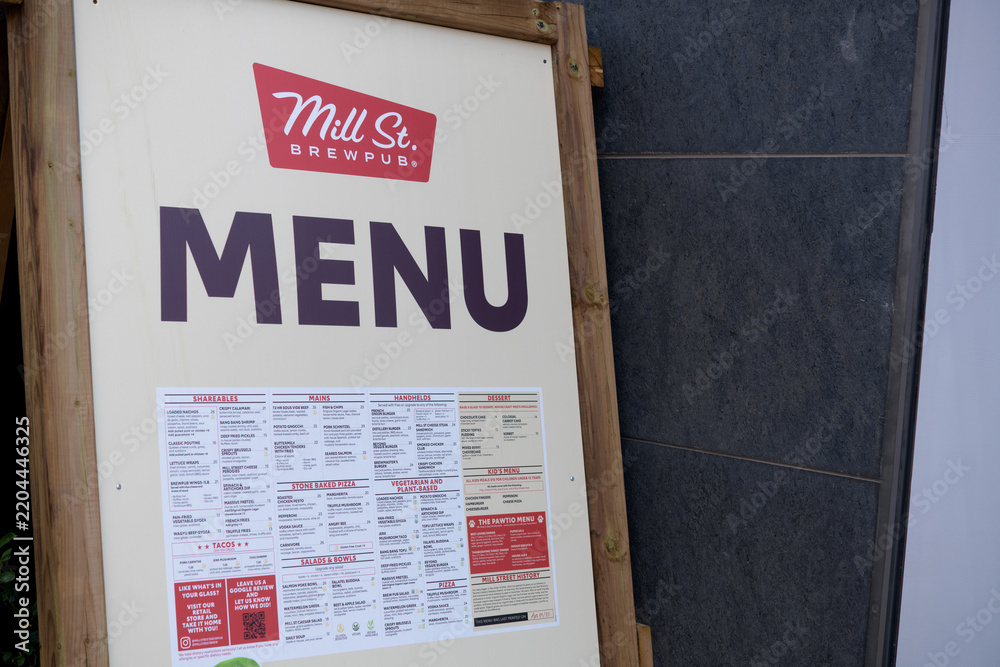 Obraz premium board with signage and menu at Mill Street Brewpub Distillery District Toronto (21 Tank House Lane)