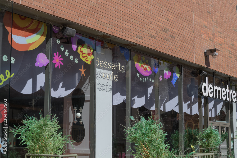 Obraz premium exterior building facade and signage at Demetres Desserts Distillery District, a dessert restaurant, located at 28 Gristmill Lane, Toronto