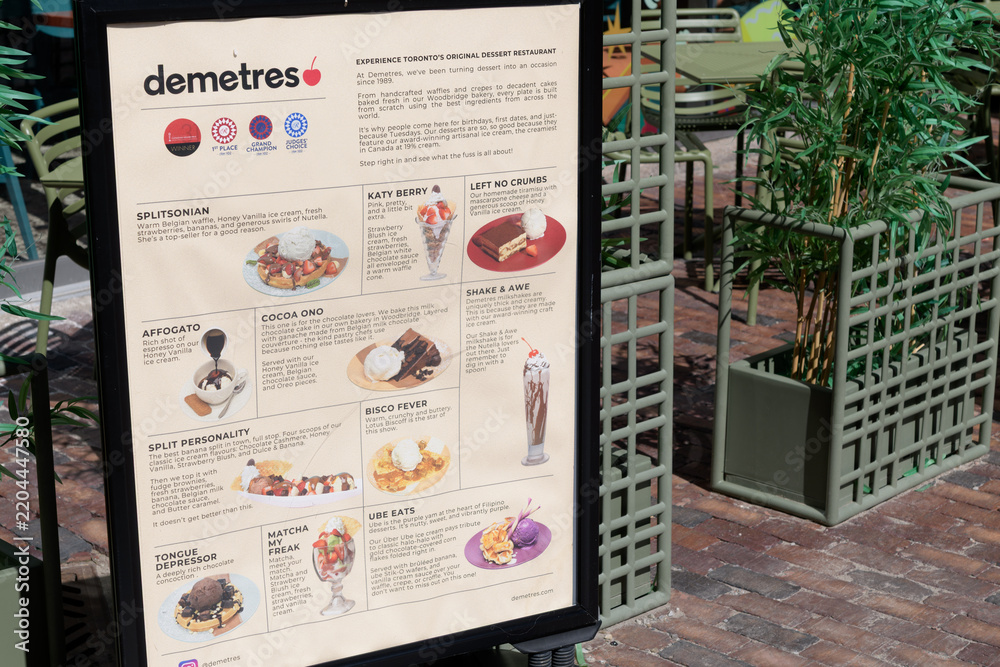 Fototapeta premium explanatory menu poster outside Demetres Desserts Distillery District, a dessert restaurant, located at 28 Gristmill Lane, Toronto