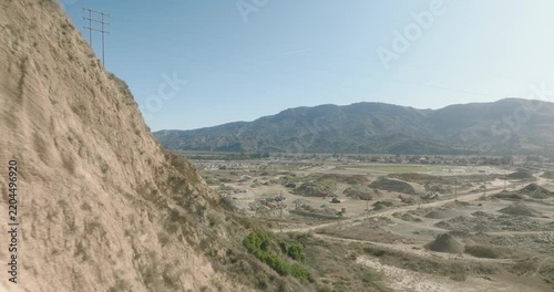 aerial view of vast badlands valley with eroded formations