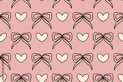 Seamless pattern with bows and hearts on a pink background