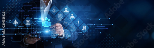 Obraz na plátně Executive director working on tablet evaluating the metrics and point of strategic global development framework structural growth planning