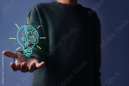 Man Open Palm Showing Lightbulb Brain Icon Illustrating Strategic Business Solutions