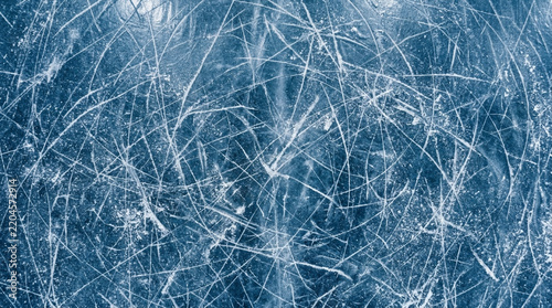 Scratched blue ice surface on a professional skating rink