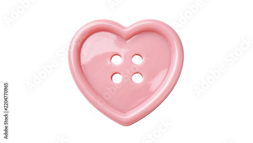 Shiny pink heart-shaped button with four holes, isolated on transparent background