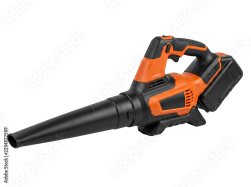 A portable cordless electric leaf blower, with an orange and black design, stands ready for use. Its nozzle extends forward, while the battery pack is visible at the rear
