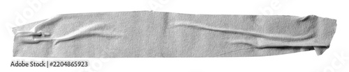 Grey crumpled torn ripped adhesive sticky tape with rough texture and copy space for text, isolated png background element