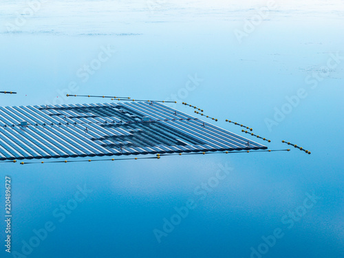Aerial view of the floating solar system at Cottbuser Ostsee, a former open pit mine currently undergoing repair works after storm damage, in Cottbus, Brandenburg, Germany.