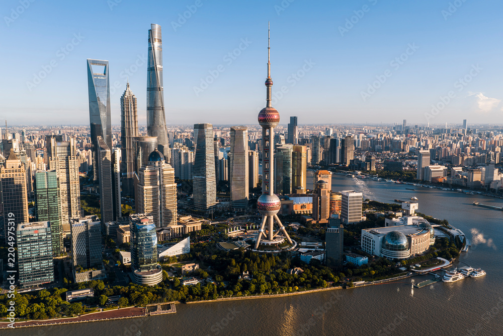 Obraz premium Aerial view of Shanghai CBD, featuring the iconic and soaring skyscrapers. This grand urban landscape reflects China's strong economic vitality. 