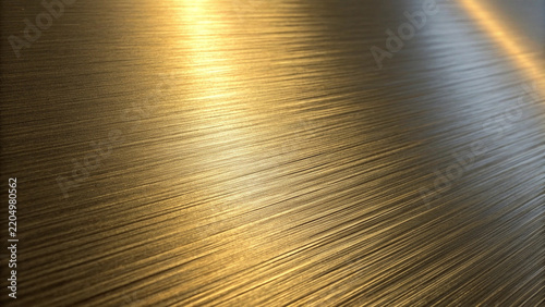 Brushed metal surface with warm golden light reflecting diagonal lines and texture