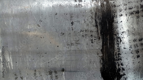 A close-up background texture abstract wall and a weathered grunge finish. Ideal for industrial overlays, rustic backdrops, urban design concepts, and building material textures