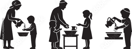 Fotografie Black silhouette of jewish parents and children washing hands before a meal, usi