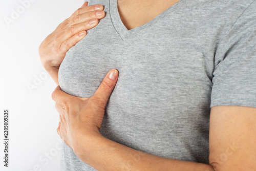 Woman Performing Breast Self-Examination for Health Check