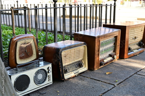 flea market. Vintage stuff. Aesthetics. Fair of old things. Sale of unnecessary things. Garage sale. Weekend Market. Dishes, souvenirs, cameras, books, music, radio, figurines. Antiques. Second hand