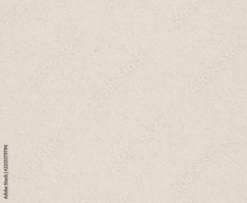 Cream fine textured paper surface as background